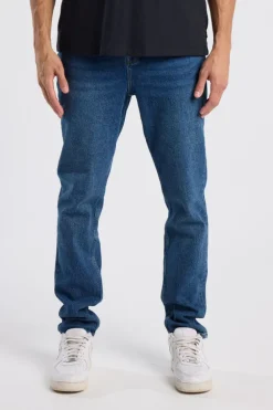 Jeans Neil slim fit jeans met button fly en zwarte wassing