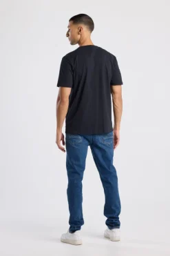 Jeans Neil slim fit jeans met button fly en zwarte wassing
