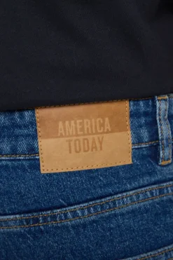 Jeans Neil slim fit jeans met button fly en zwarte wassing