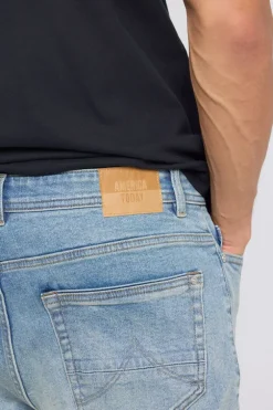 Jeans Neil slim fit jeans met knoopsluiting en stretchcomfort