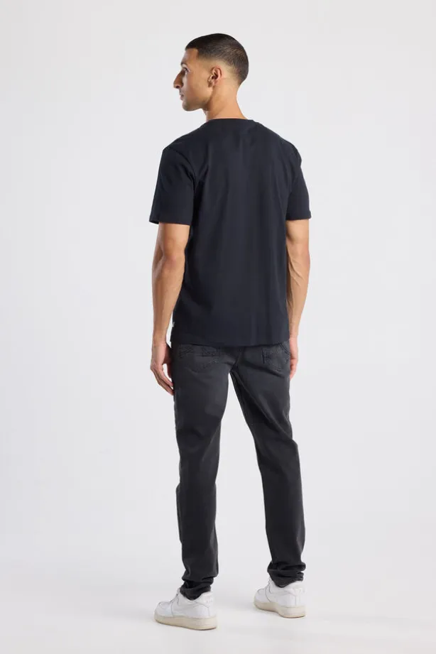 Jeans Neil slim fit jeans met knoopsluiting en stretchcomfort