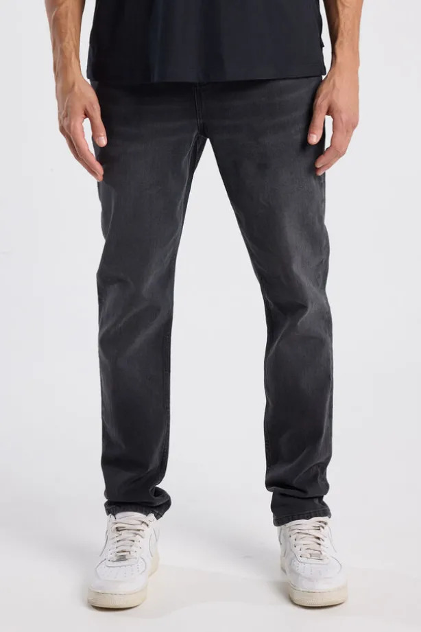 Jeans Neil slim fit jeans met knoopsluiting en stretchcomfort