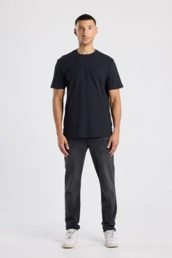 Jeans Neil slim fit jeans met knoopsluiting en stretchcomfort
