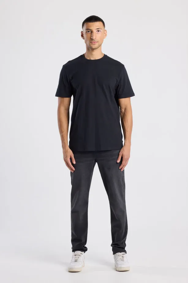 Jeans Neil slim fit jeans met knoopsluiting en stretchcomfort