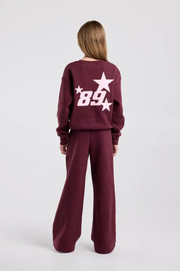 Joggingbroek Cassia Jr wide leg joggingbroek met bordeaux piping