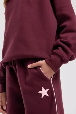 Joggingbroek Cassia Jr wide leg joggingbroek met bordeaux piping