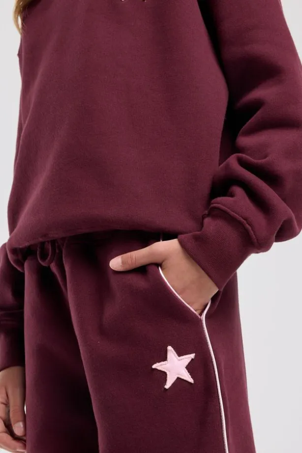 Joggingbroek Cassia Jr wide leg joggingbroek met bordeaux piping