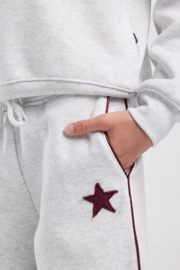 Joggingbroek Cassia Jr wide leg joggingbroek met bordeaux piping