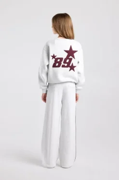 Joggingbroek Cassia Jr wide leg joggingbroek met bordeaux piping