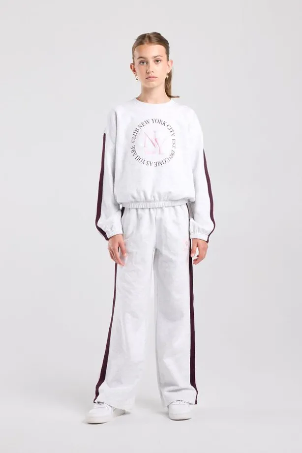 Joggingbroek Cristy Jr wide leg joggingbroek met zijstreep en embroidery