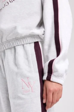 Joggingbroek Cristy Jr wide leg joggingbroek met zijstreep en embroidery