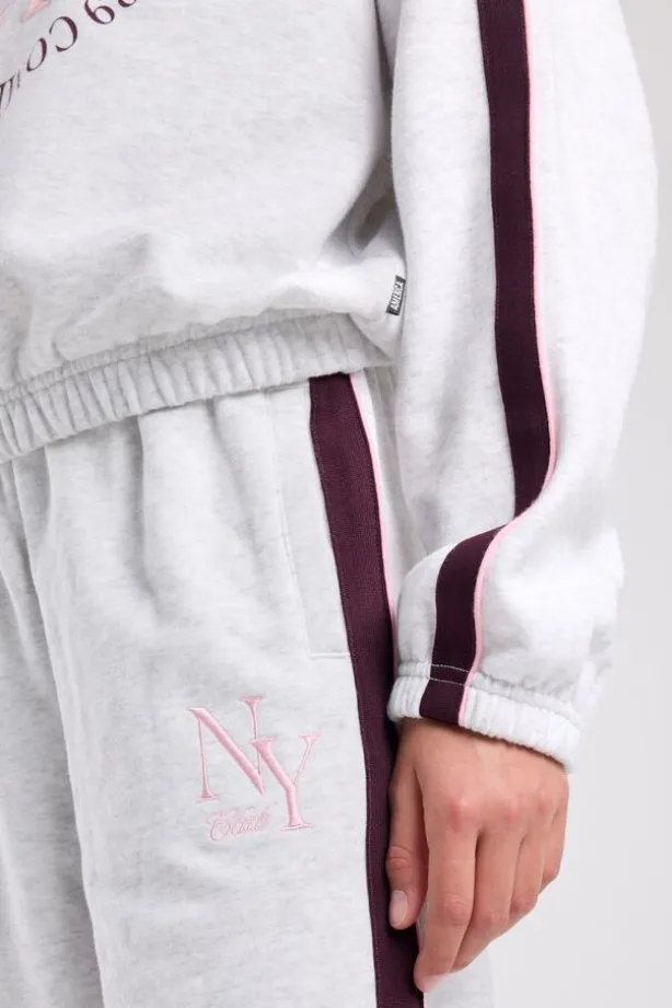 Joggingbroek Cristy Jr wide leg joggingbroek met zijstreep en embroidery