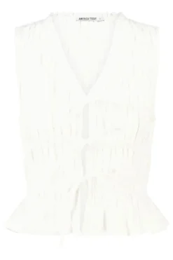 Top Ilka gesmockte haltertop met strikjes en ruffles