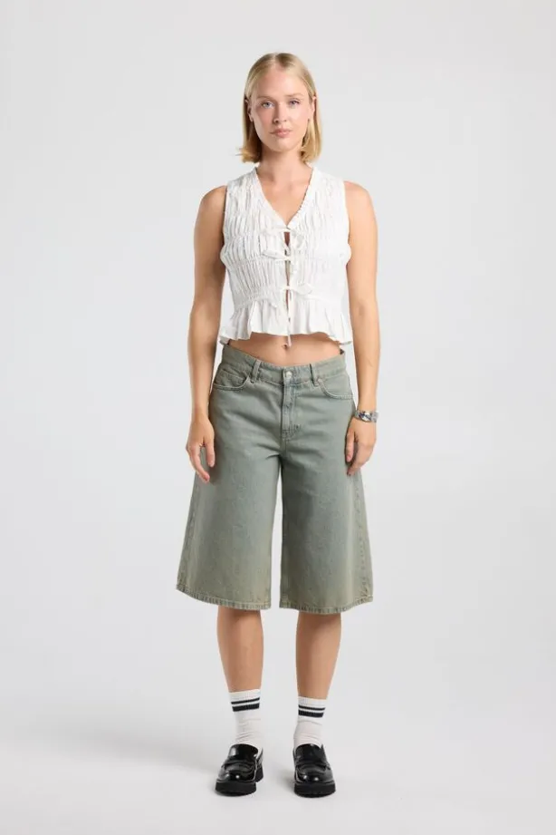 Top Ilka gesmockte haltertop met strikjes en ruffles