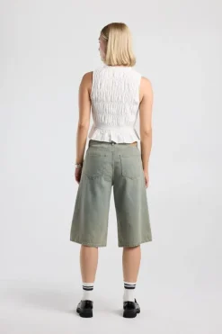Top Ilka gesmockte haltertop met strikjes en ruffles