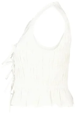 Top Ilka gesmockte haltertop met strikjes en ruffles